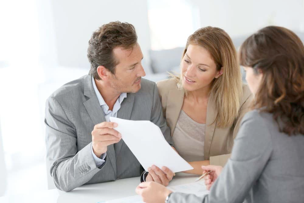 A family viewing a protected financial plan, symbolizing legacy and preparedness